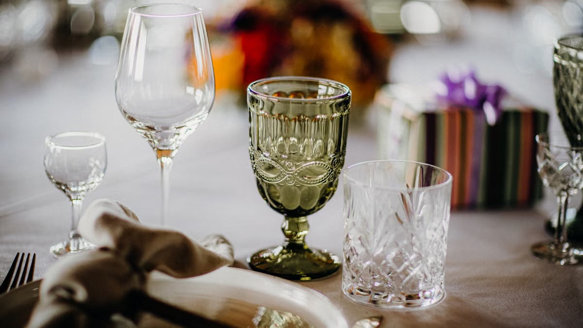 An elegant table setting featuring various glassware for a refined dining experience.